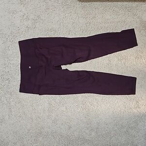 Athleta salutation stash 7/8 tight size L